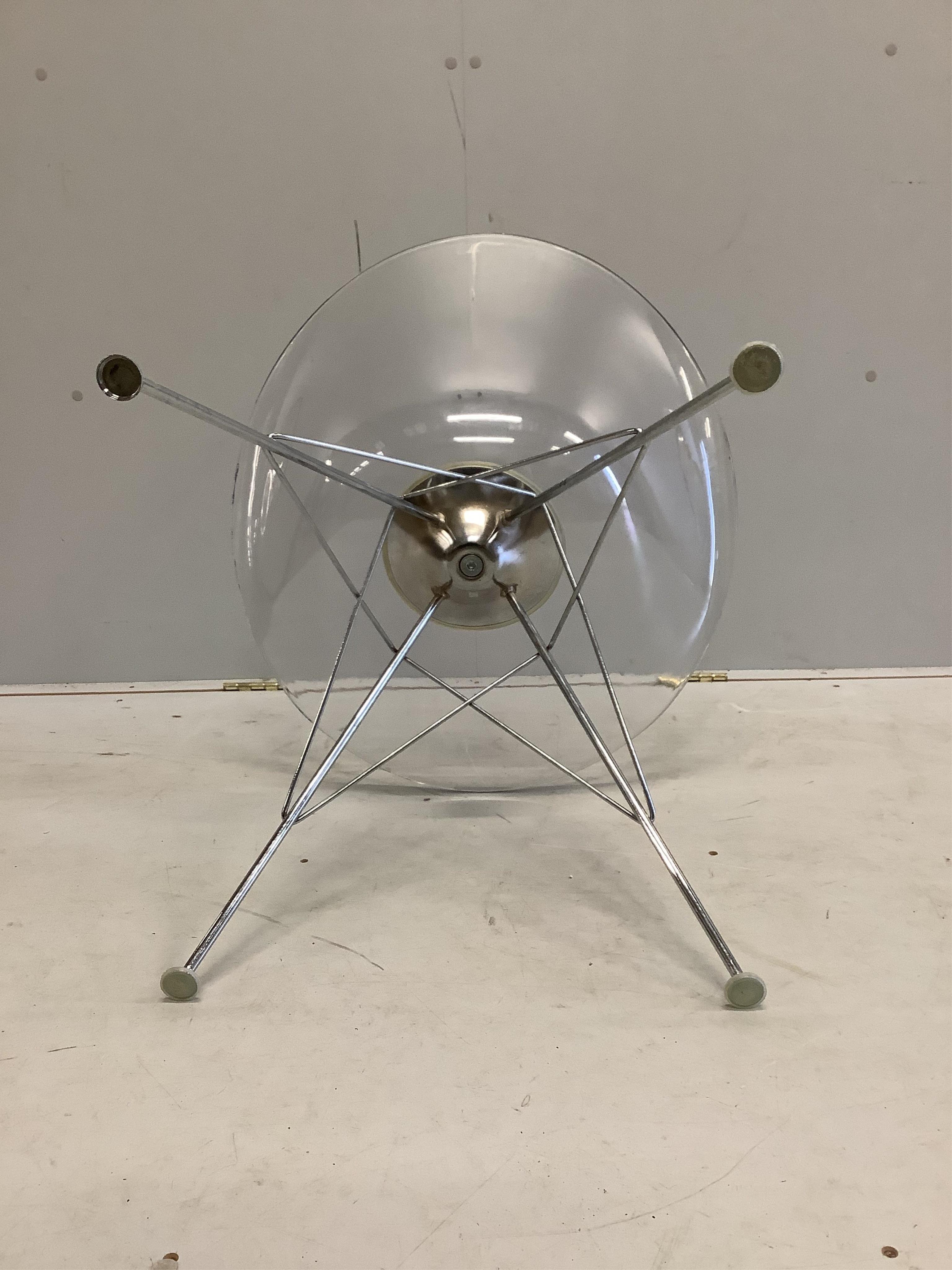 A Philip Starck style Eros transparent chair on “Eiffel Tower” base, width 61cm, depth 60cm, height 81cm. Condition - fair, minor chips and surface scratches.